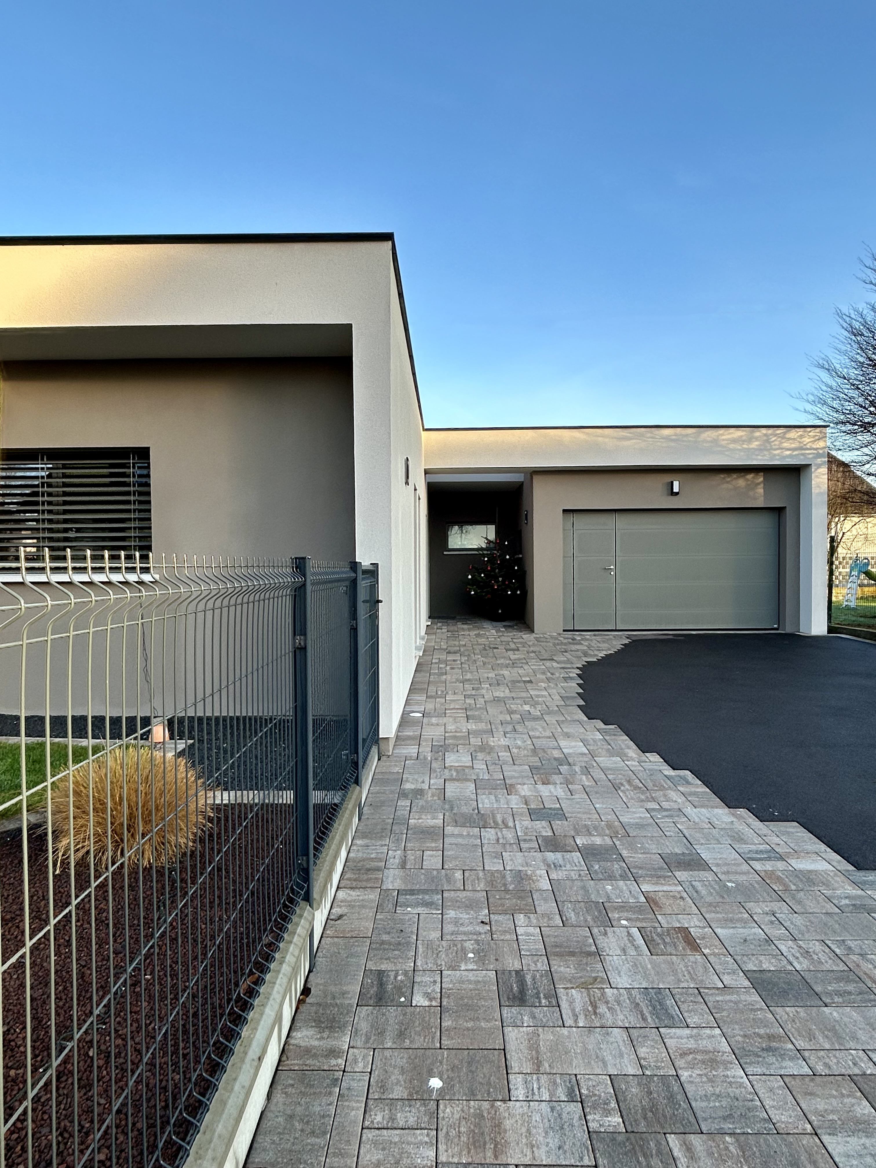 Construction d’une maison à toiture plate à Grussenheim Maison Néo de plain-pied